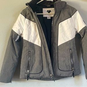 Obermeyer kid size Medium ski jacket with arm, inside, and outside pockets